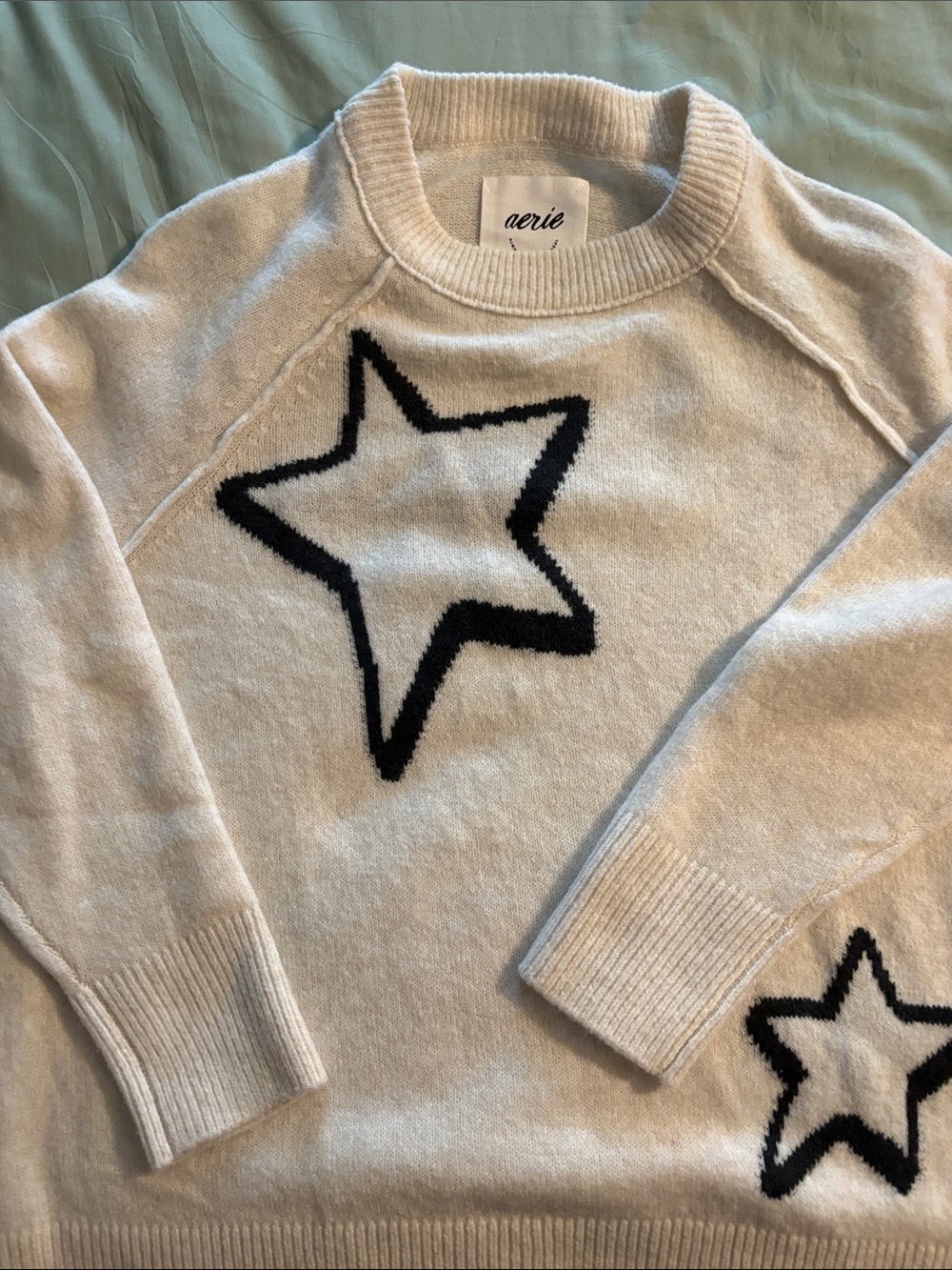 aerie Cream Crewneck Sweater with Black Star Accents